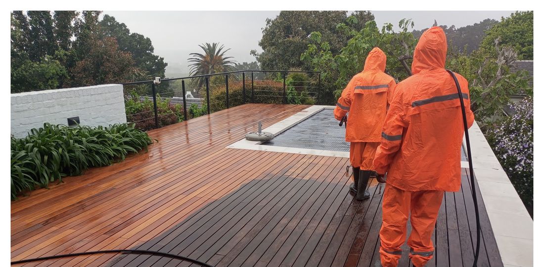 The ProWash team cleaning a rooftop pool deck in Cape Town